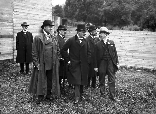 Winston Churchill and Lloyd George standing behind Winston Churchill Left shoulder