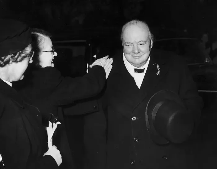Framed Print : Winston Churchill MP and former WW2 British Prime Minister being congratulated by one of Framed Print : Winston Churchill MP and former WW2 British Prime Minister being congratulated by one of