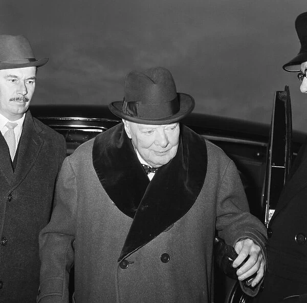 Winston Churchill pictured leaving London airport for Nice in the south of France