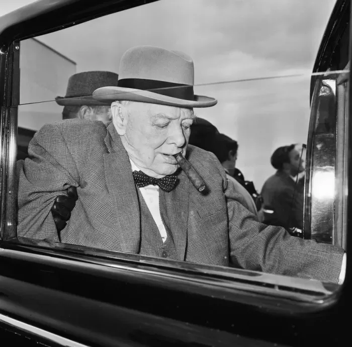 Framed Print : Winston Churchill pictured at London airport as he returns to England from holiday in