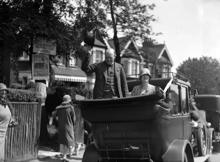 Framed Print : Winston Churchill is seen with his wife Clementine Churchill in an open topped car Framed Print : Winston Churchill is seen with his wife Clementine Churchill in an open topped car