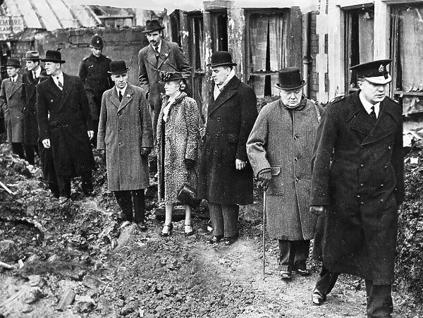 Winston Churchill, Sir Charles Maby and Mrs Churchill visit a bombed area in Bristol