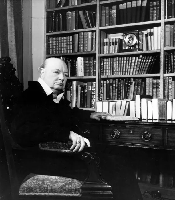 Framed Print : Winston Churchill sitting in front of a large bookcase 1951 Framed Print : Winston Churchill sitting in front of a large bookcase 1951