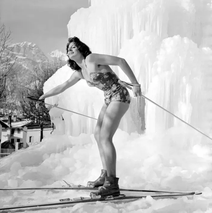 Framed Print : Winter Olympic Games 1956 Model in swimwear posing with skis on the ice - Framed Print : Winter Olympic Games 1956 Model in swimwear posing with skis on the ice -