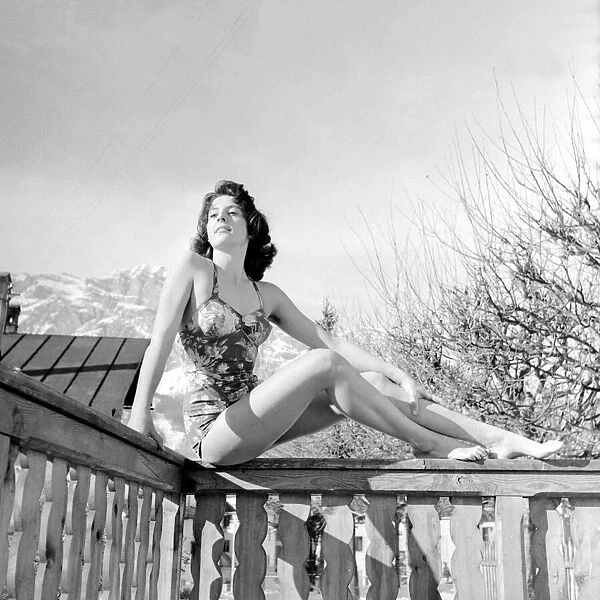 Winter Olympic Games 1956 A model wearing swimwear posing on a balcony