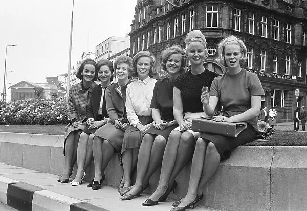 Wives of seven of the players from the Reykjavik football team of Iceland sitting on a