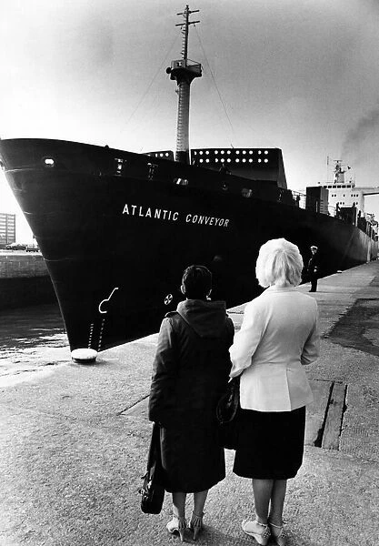Two wives watch as the The Atlantic Conveyor, a British merchant navy ship