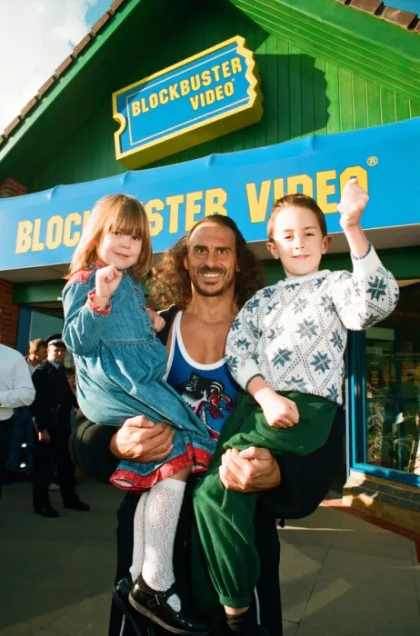 Framed Print : Wolf from Gladiators opening the new Blockbuster Video in Reading. 6th November 1994 Framed Print : Wolf from Gladiators opening the new Blockbuster Video in Reading. 6th November 1994