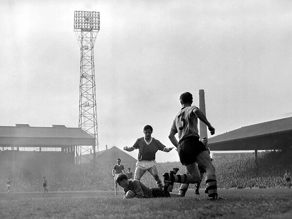 Wolverhampton goalkeeper Sidebottom falls to the ground on the ball in front of