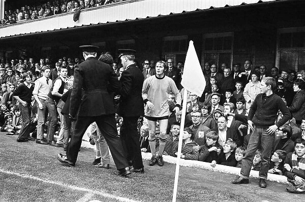 Wolverhampton Wanderers Vs. Everton. Police take an injured female fan to the first