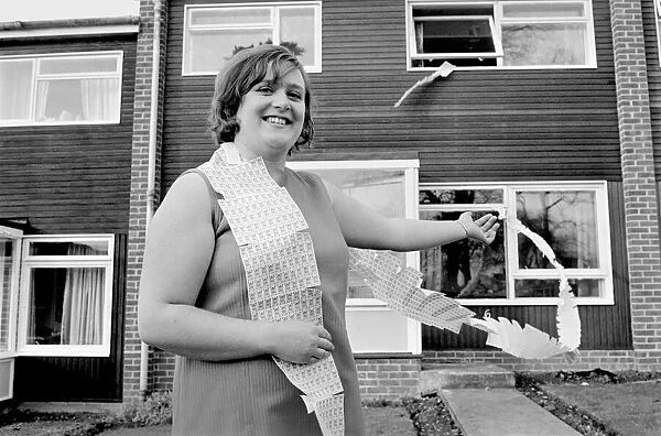 Woman with the 11, 000 trading stamps which came with her new house in Barn Close