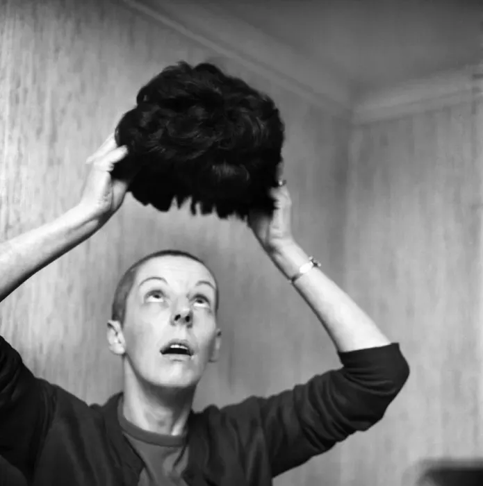 Framed Print : Woman with a bald head, with her wig. November 1969 Z11155-008