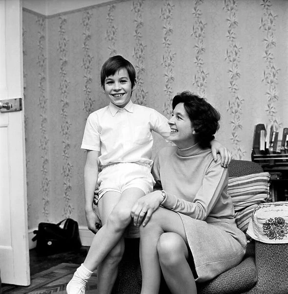 A woman and her boy at home. November 1969 Z11231-001