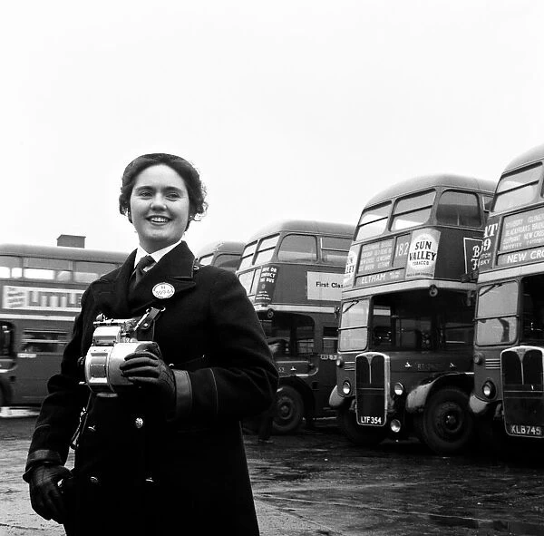 Woman Bus Conductor by Red Double Decker Buses - 1960