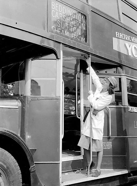 Woman Bus Conductor during the War - 1941 Women doing mens jobs during the war