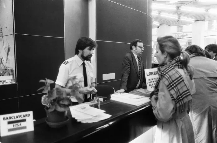 Framed Print : A woman customer at the Victoria check in office, pictured on the day that Laker Airways Framed Print : A woman customer at the Victoria check in office, pictured on the day that Laker Airways