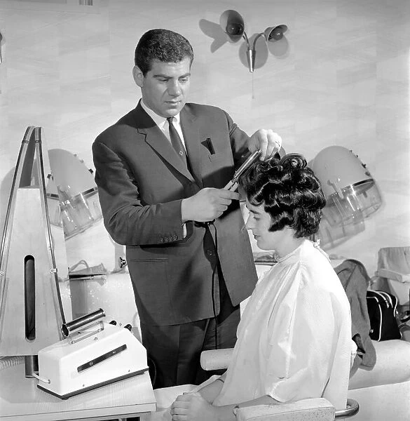 Woman have her hair cut and curled at the hair dressers, 7th June 1962