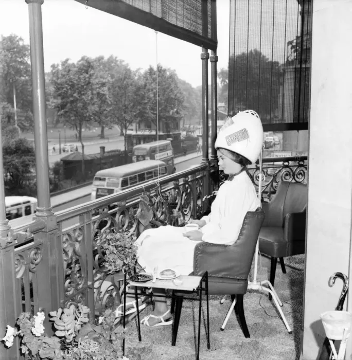 Framed Print : Woman Hairdressers A Client at Mr Freddie Frenchs Park lane balcony hairdressing