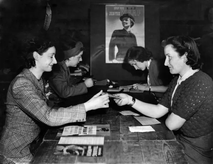 Framed Print : A woman registers for war work at the Burnt Oak labours exchange after they marked Framed Print : A woman registers for war work at the Burnt Oak labours exchange after they marked