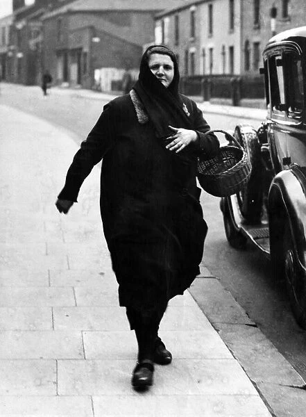 A woman shopper in Manchester. Circa 1936