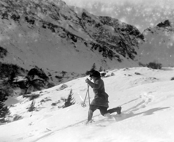 Woman skiing on the mountain slopes at Murren, Switzerland 1922