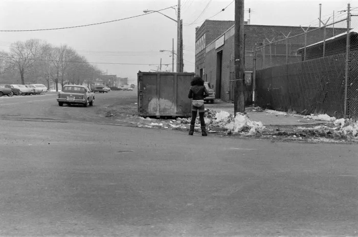 Framed Print : A woman standing in the road in New York, wearing bikini pants and leggings Framed Print : A woman standing in the road in New York, wearing bikini pants and leggings