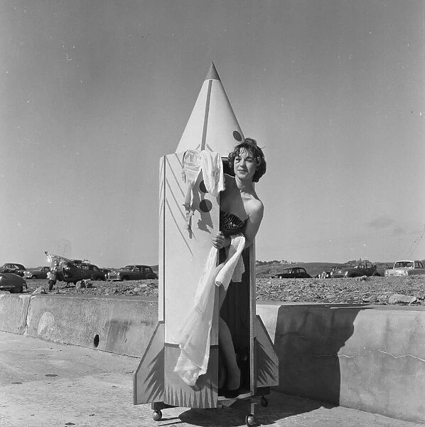 A woman tries out a new bathing machine at the Water Spalsh beach at St