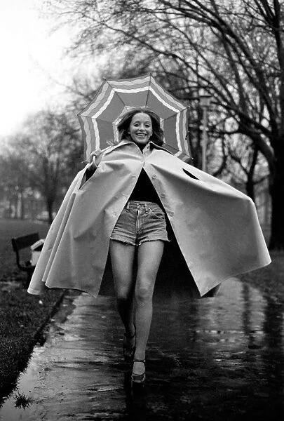 Woman  /  Umbrella  /  Humour: Actress Cheryl Gilham. January 1975 75-00534-005