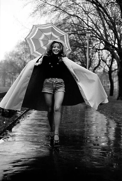 Woman  /  Umbrella  /  Humour: Actress Cheryl Gilham. January 1975 75-00534-003