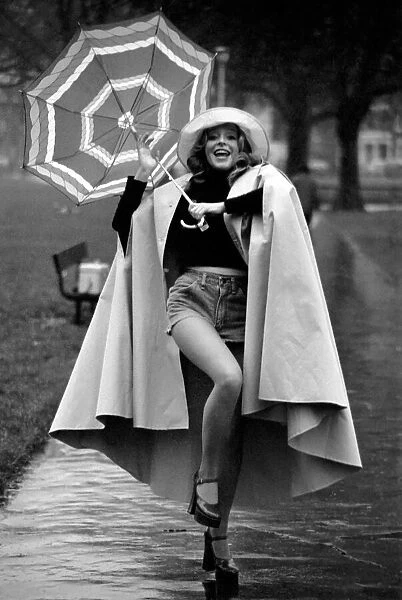 Woman  /  Umbrella  /  Humour: Actress Cheryl Gilham. January 1975 75-00534-002