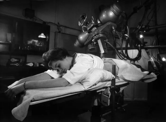Framed Print : Woman undergoing a cancer check at an X ray unit in a London hospital