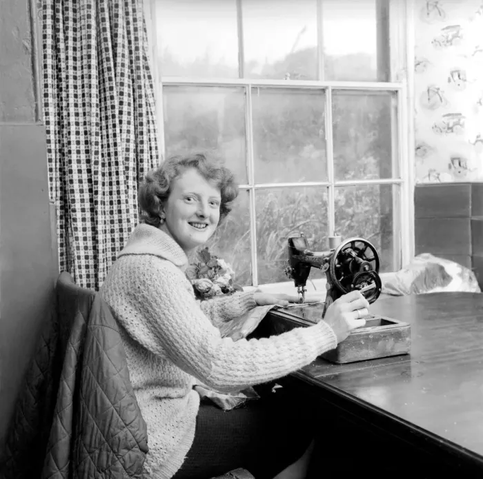Framed Print : Woman using sewing machine. Circa 1964 A1137b-002 Framed Print : Woman using sewing machine. Circa 1964 A1137b-002