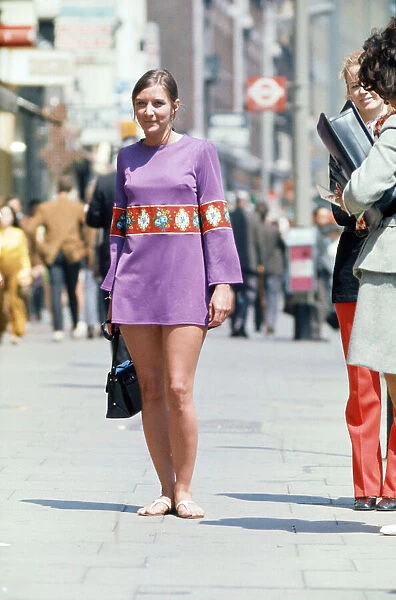 Woman walking down Kings Road, Chelsea, London. June 1970