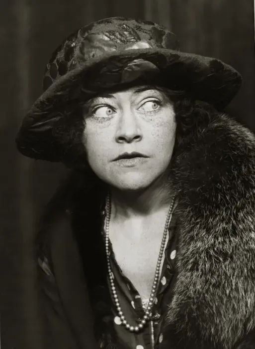 Framed Print : A woman wearing 1920s style clothing including coat, big hat and necklace Framed Print : A woman wearing 1920s style clothing including coat, big hat and necklace