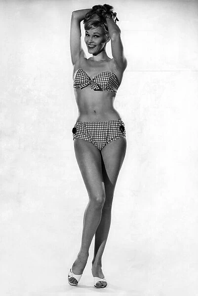 Woman wearing a bikini. June 1962 P011074