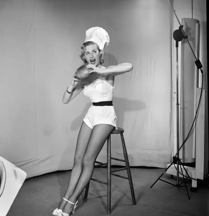 Framed Print : Woman wearing chefs hat holding loaf of bread. 1959 E61-011 Framed Print : Woman wearing chefs hat holding loaf of bread. 1959 E61-011