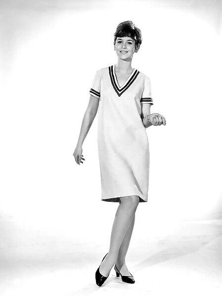 Woman wearing cricket dress. 1959