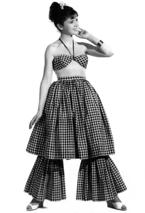 Framed Print : Woman wearing flared, checked dress. Reveille Fashions. Rosemary Bell. April 1962 P008849 Framed Print : Woman wearing flared, checked dress. Reveille Fashions. Rosemary Bell. April 1962 P008849