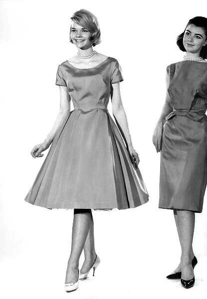 Woman wearing flared dress November 1962 P008868