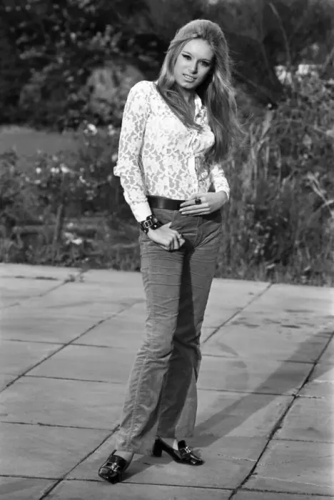 Framed Print : Woman wearing Hippy flared trousers and top. October 1969 Framed Print : Woman wearing Hippy flared trousers and top. October 1969