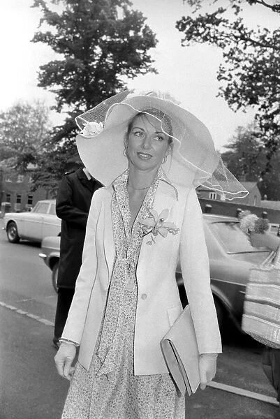 Woman wearing a large hatduring the second day of races at Ascot today