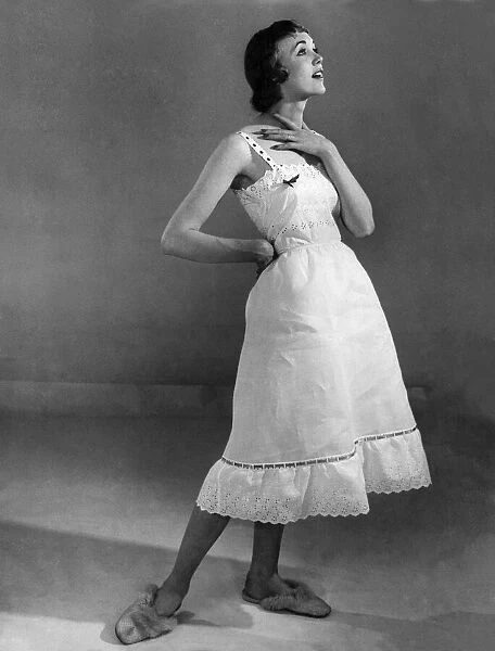 Woman wearing a nightdress. May 1955 P018250