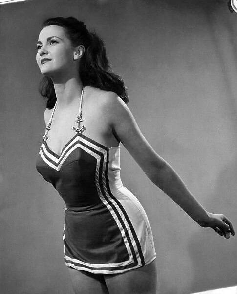 Woman wearing one piece swimsuit April 1952 P017651