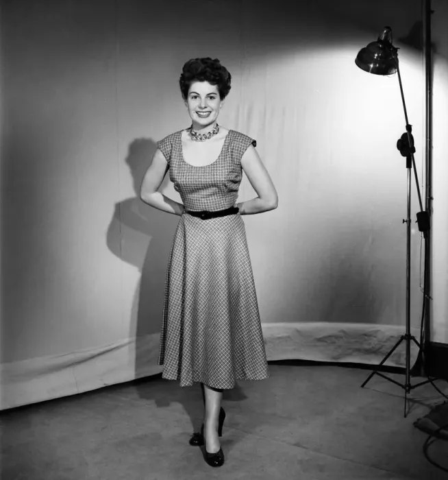 Framed Print : Woman wearing a pinafore dress November 1952 C6272-002 Framed Print : Woman wearing a pinafore dress November 1952 C6272-002