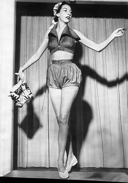 Woman wearing a top and shorts May 1952 P017654