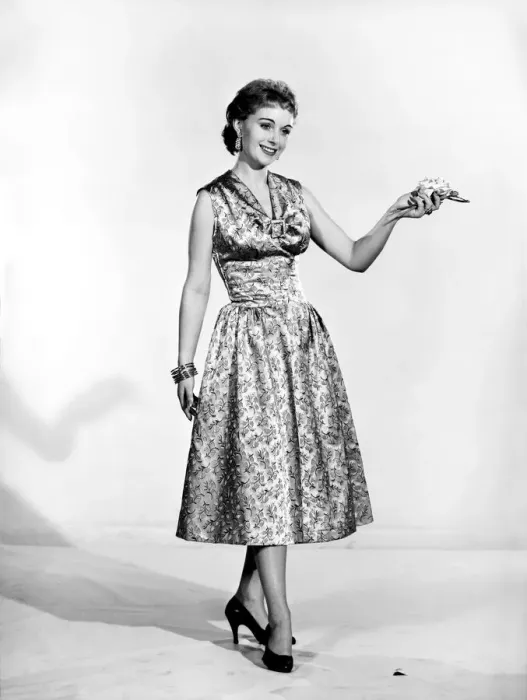 Framed Print : Woman wearing silk summer dress. Circa 1955