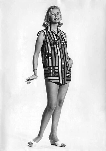 Woman wearing sleveless shirt. July 1961 P008777