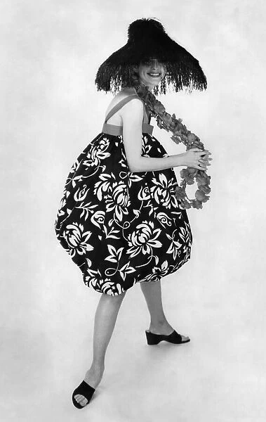 Woman wearing a summer dress. January 1959 P018026