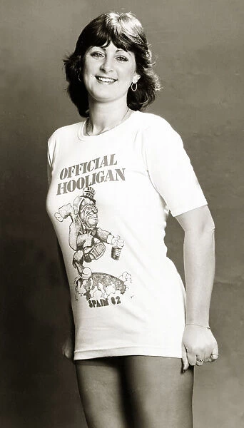 Woman wearing t-shirt reading Official Hooligan - Spain 1982