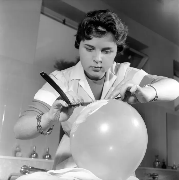 Framed Print : Women barbers training with cut throat razors, learn how to shave by using balloons Framed Print : Women barbers training with cut throat razors, learn how to shave by using balloons